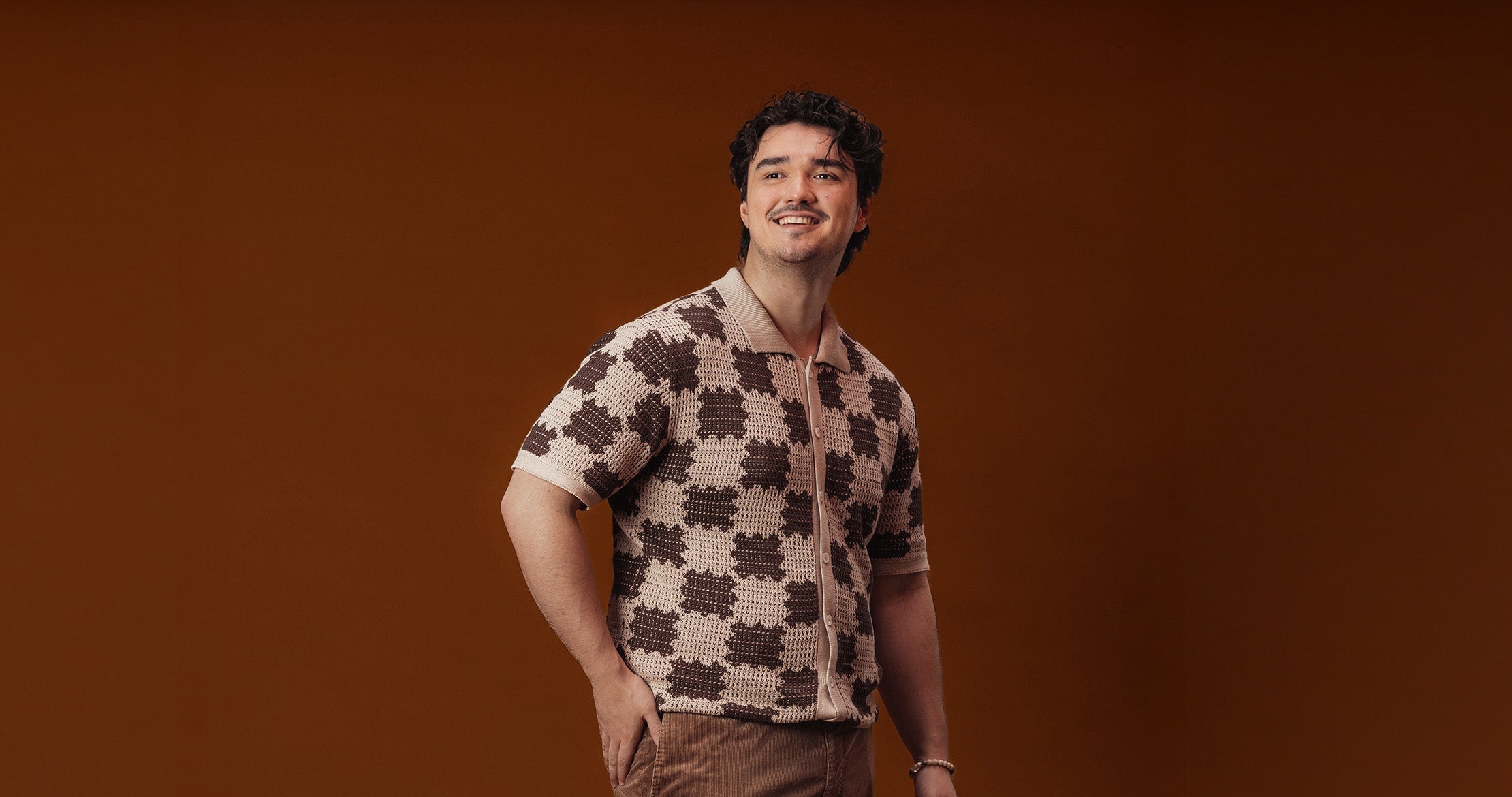 Man holding AndYou product bottle